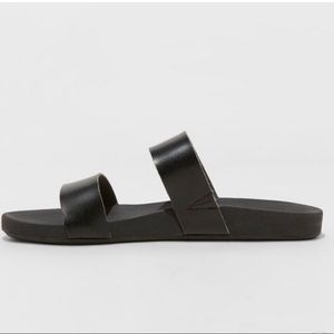 Black two strap slip on faux leather sandal